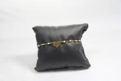 Bracelet doré cœur et perle blanche – symbole d'amour et de délicatesse / Gouden armband met hart en witte parel – symbool van liefde en zachtheid / Gold bracelet with heart and white pearl – symbol of love and softness