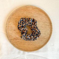 Foto van het artikel LUIPAARD – Handgemaakte scrunchie – stijlvolle en kleurrijke upcycling