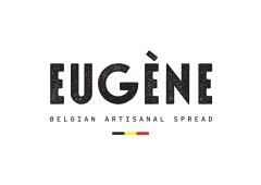 Logo Eugène – symbole du savoir-faire gourmand belge. Derrière ce nom, une passion : créer des pâtes à tartiner bio, artisanales et pleines de sens. Eugène représente une nouvelle génération de chocolatiers responsables, où chaque pot marie goût, nature et éthique. / Het merk Eugène staat voor Belgische ambacht, biologische ingrediënten en bewuste lekkernijen. / Eugène – Belgian artisanal spreads brand combining sustainability, local craftsmanship and irresistible flavor. A new taste of conscious indulgence.