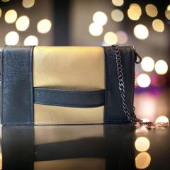 Photo de l'article Pochette élégante noire et dorée – Fait main, chic et intemporelle