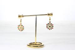 Photo de l'article boucle d'oreille doré pendentif flocon de noël coloré