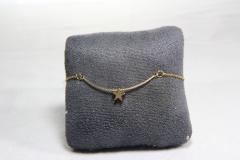 Photo de l'article bracelet doré arc étoile