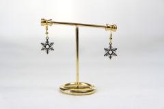 Photo de l'article boucle d'oreille doré flocon de neige
