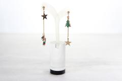 Photo de l'article Boucles d’oreilles Noël dorées asymétriques