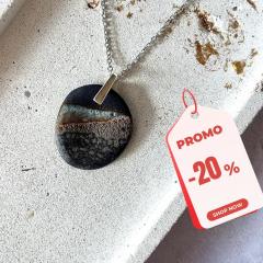 Picture of the product Black porcelain necklace. Magma – Honey Dew gradient. Sterling silver bail.