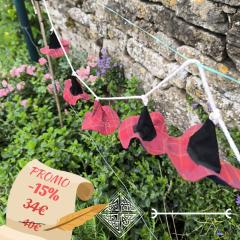 Picture of the product PROMO -15% Scottish Witch Garland – Handmade with 10 mini tartan hats in recycled fabric for a cozy and eco-magical vibe