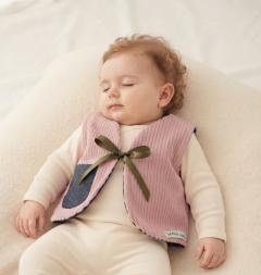 Picture of the product 6/9 month - Pink corduroy sheperd vest.