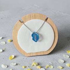 Photo de l'article Collier en résine - bouche bleu