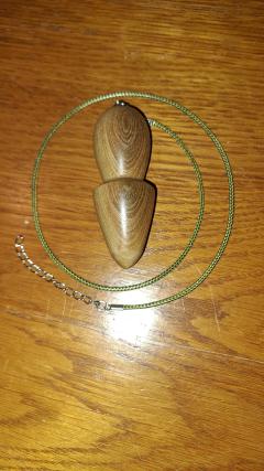 Foto van het artikel pendule radiesthésiste en Bouleau